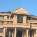 临沂黄金麻别墅外墙干挂石材效果示例