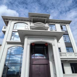 临沂白麻别墅外墙干挂石材效果示例