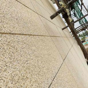 临沂 黄金麻花岗岩荔枝面外墙干挂石材效果示例