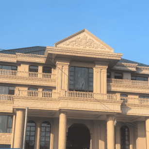 临沂黄金麻别墅外墙干挂石材效果示例