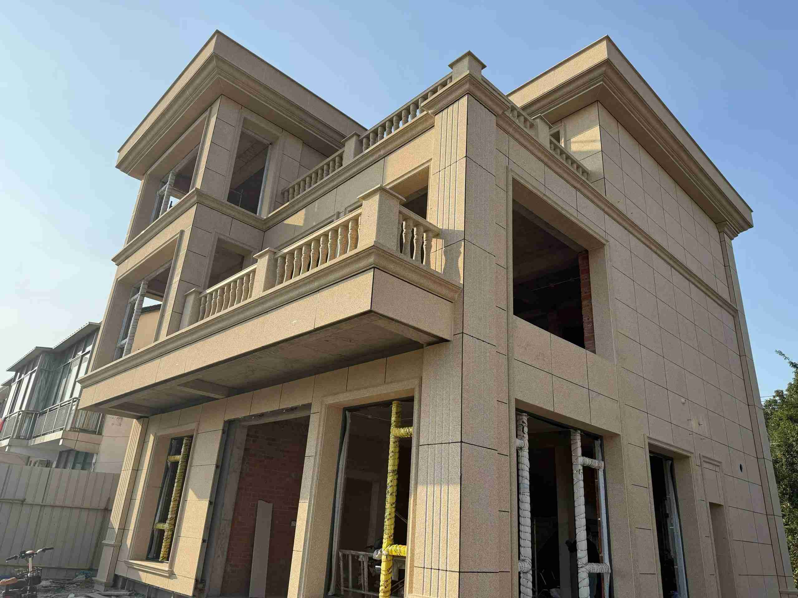 临沂 黄金麻花岗岩石材荔枝面外墙干挂效果展示